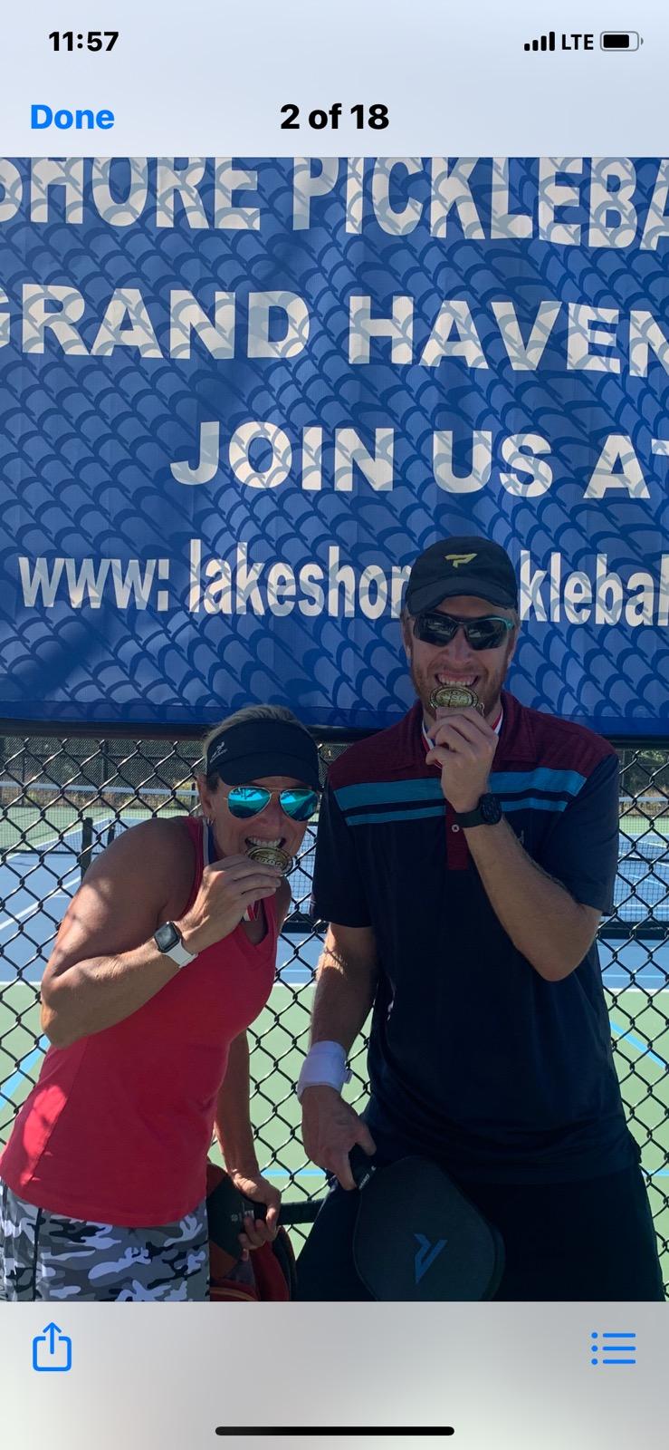 Jen Sorber and Jaron celebrating tournament medals